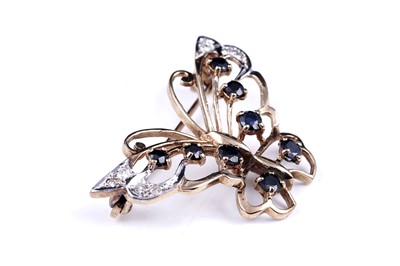 Lot 4 - A 20th Century Modern sapphire and diamond butterfly pattern brooch