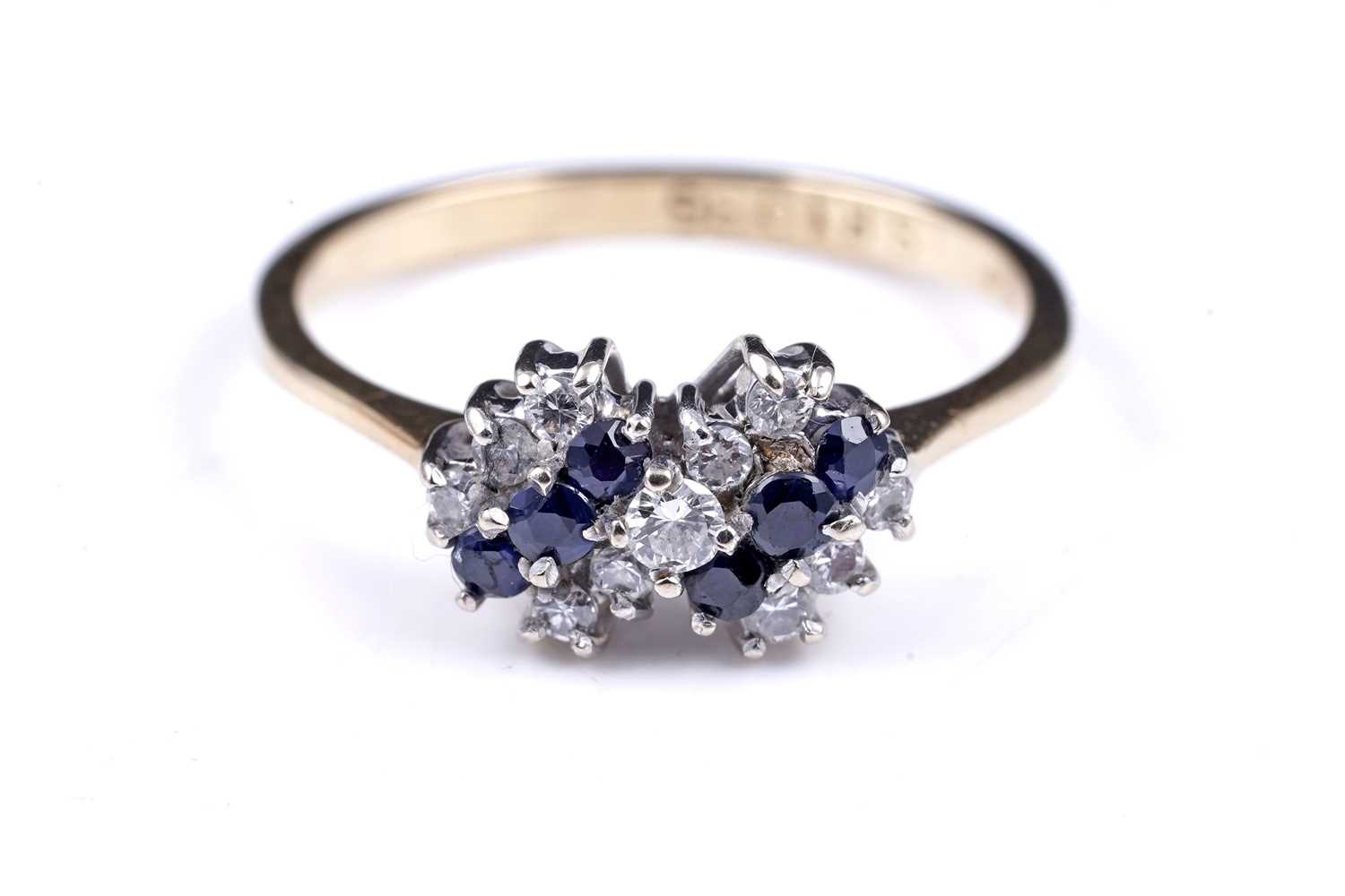 Lot 6 - A 20th Century modern sapphire and diamond ring