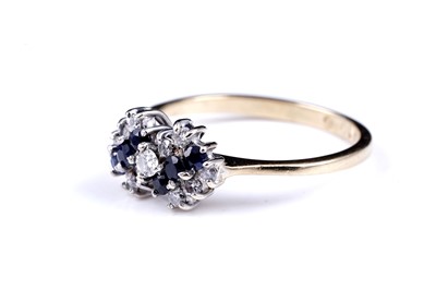 Lot 6 - A 20th Century modern sapphire and diamond ring