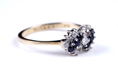Lot 6 - A 20th Century modern sapphire and diamond ring