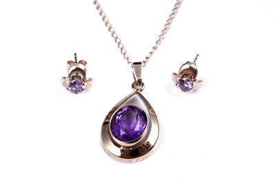 Lot 14 - A modern amethyst pendant necklace; and a pair of stud earrings
