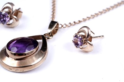 Lot 14 - A modern amethyst pendant necklace; and a pair of stud earrings