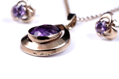 Lot 14 - A modern amethyst pendant necklace; and a pair of stud earrings
