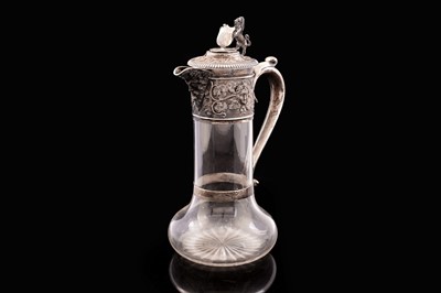 Lot 65 - An Edwardian Scottish silver mounted clear glass claret jug