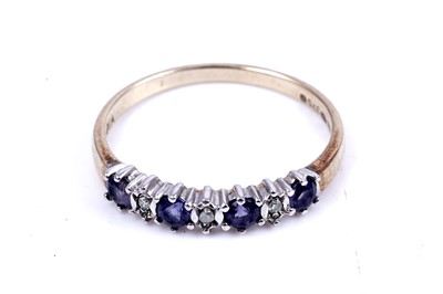 Lot 40 - An opal and tanzanite ring; and a tanzanite and diamond half hoop ring