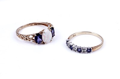 Lot 40 - An opal and tanzanite ring; and a tanzanite and diamond half hoop ring