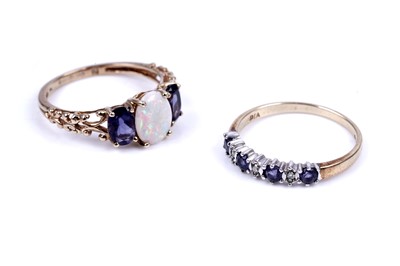 Lot 40 - An opal and tanzanite ring; and a tanzanite and diamond half hoop ring