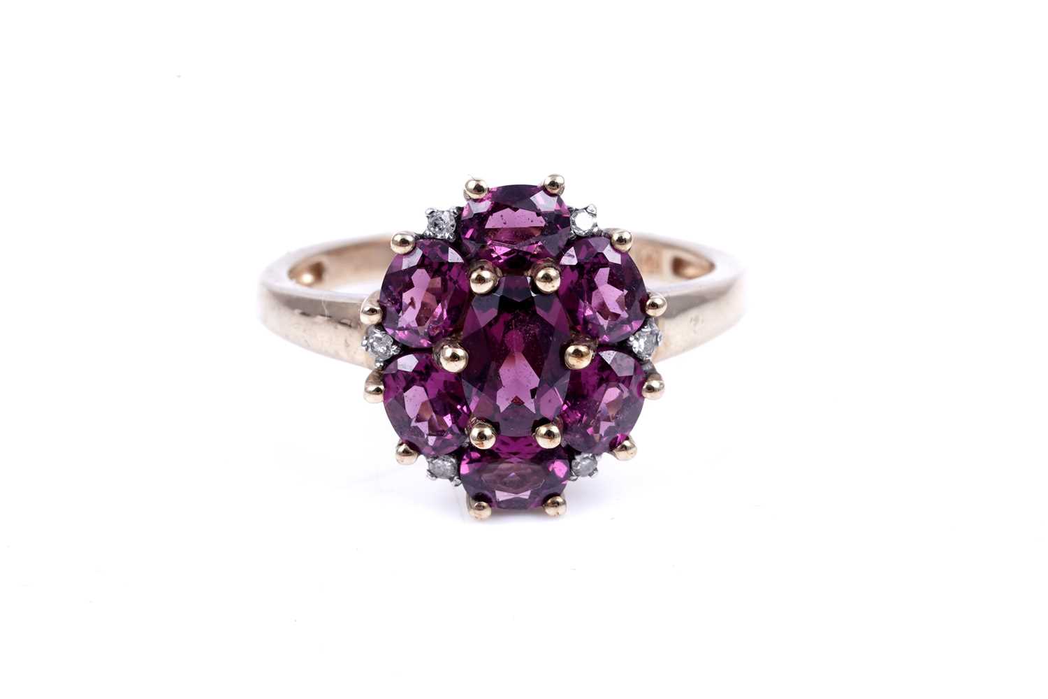 Lot 44 - A pink tourmaline and diamond cluster ring