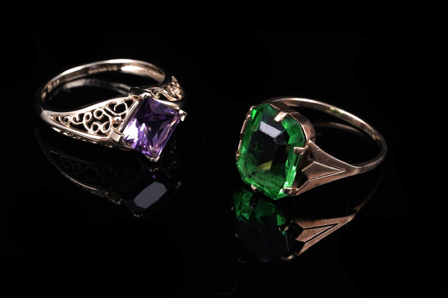 Lot 45 - An early 20th Century Art Deco green paste ring; and a purple spinel dress ring