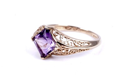 Lot 45 - An early 20th Century Art Deco green paste ring; and a purple spinel dress ring