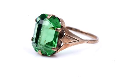 Lot 45 - An early 20th Century Art Deco green paste ring; and a purple spinel dress ring