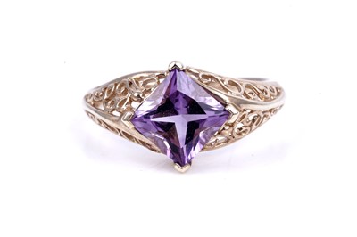 Lot 45 - An early 20th Century Art Deco green paste ring; and a purple spinel dress ring