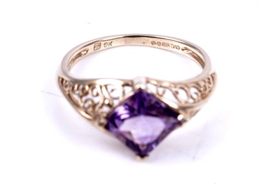 Lot 45 - An early 20th Century Art Deco green paste ring; and a purple spinel dress ring