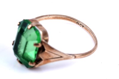 Lot 45 - An early 20th Century Art Deco green paste ring; and a purple spinel dress ring