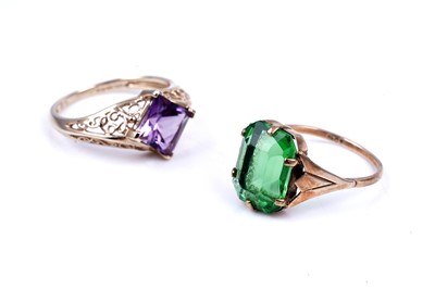 Lot 45 - An early 20th Century Art Deco green paste ring; and a purple spinel dress ring