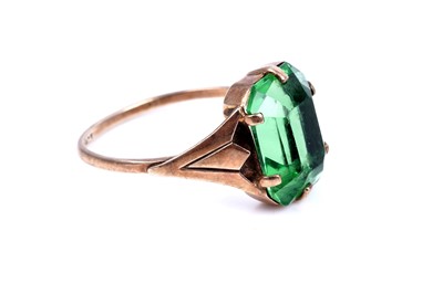 Lot 45 - An early 20th Century Art Deco green paste ring; and a purple spinel dress ring
