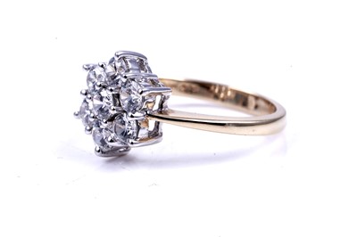 Lot 46 - A contemporary cubic zirconia flower pattern cluster ring