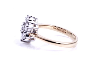 Lot 46 - A contemporary cubic zirconia flower pattern cluster ring