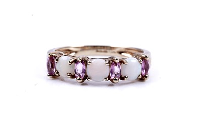 Lot 47 - A modern opal and pink sapphire half hoop eternity ring; and an opal and tanzanite cluster ring