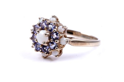 Lot 47 - A modern opal and pink sapphire half hoop eternity ring; and an opal and tanzanite cluster ring