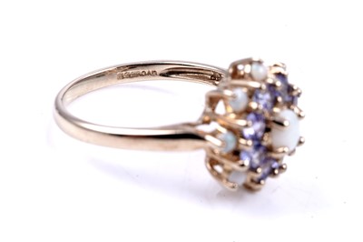 Lot 47 - A modern opal and pink sapphire half hoop eternity ring; and an opal and tanzanite cluster ring