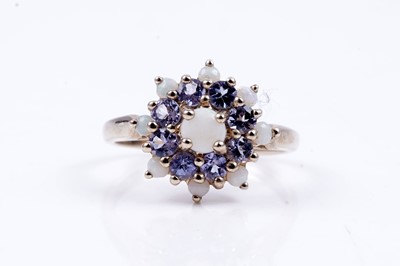 Lot 47 - A modern opal and pink sapphire half hoop eternity ring; and an opal and tanzanite cluster ring
