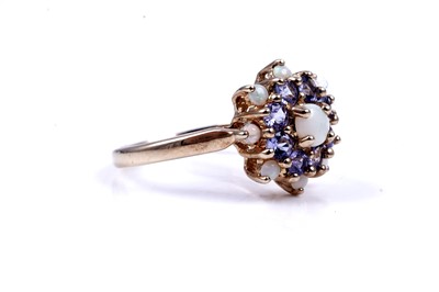 Lot 47 - A modern opal and pink sapphire half hoop eternity ring; and an opal and tanzanite cluster ring