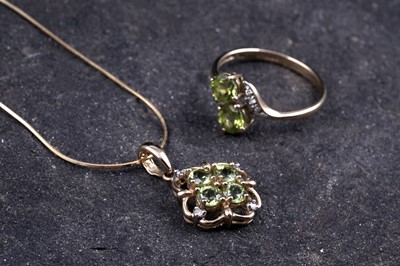 Lot 54 - A contemporary peridot pendant necklace and ring set