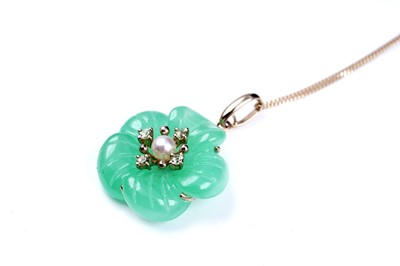 Lot 59 - A jade and yellow tourmaline flower pattern pendant; and a loveheart pendant on chain