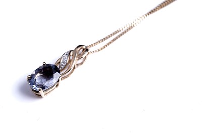 Lot 63 - A sapphire pendant necklace; and a topaz pendant necklace