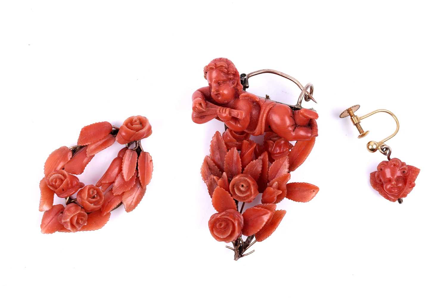 Lot 20 - A 19th Century Romantic Period coral pendant brooch and earring set