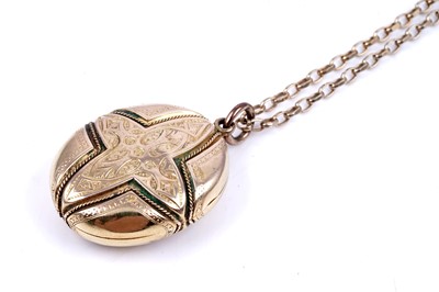 Lot 21 - A Victorian Gothic Revival locket on a 9ct gold fancy-link chain