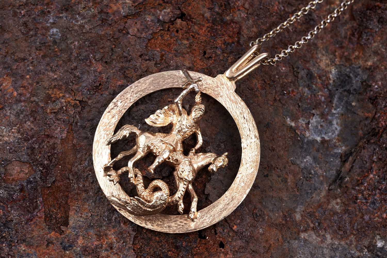 Lot 22 - A 1970s 9ct gold St. George pendant