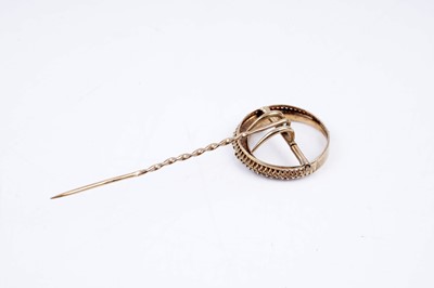 Lot 24 - An Edwardian crescent moon pattern stick pin set with seed pearls