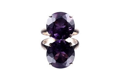 Lot 92 - A 20th Century amethyst dress ring