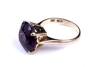 Lot 92 - A 20th Century amethyst dress ring