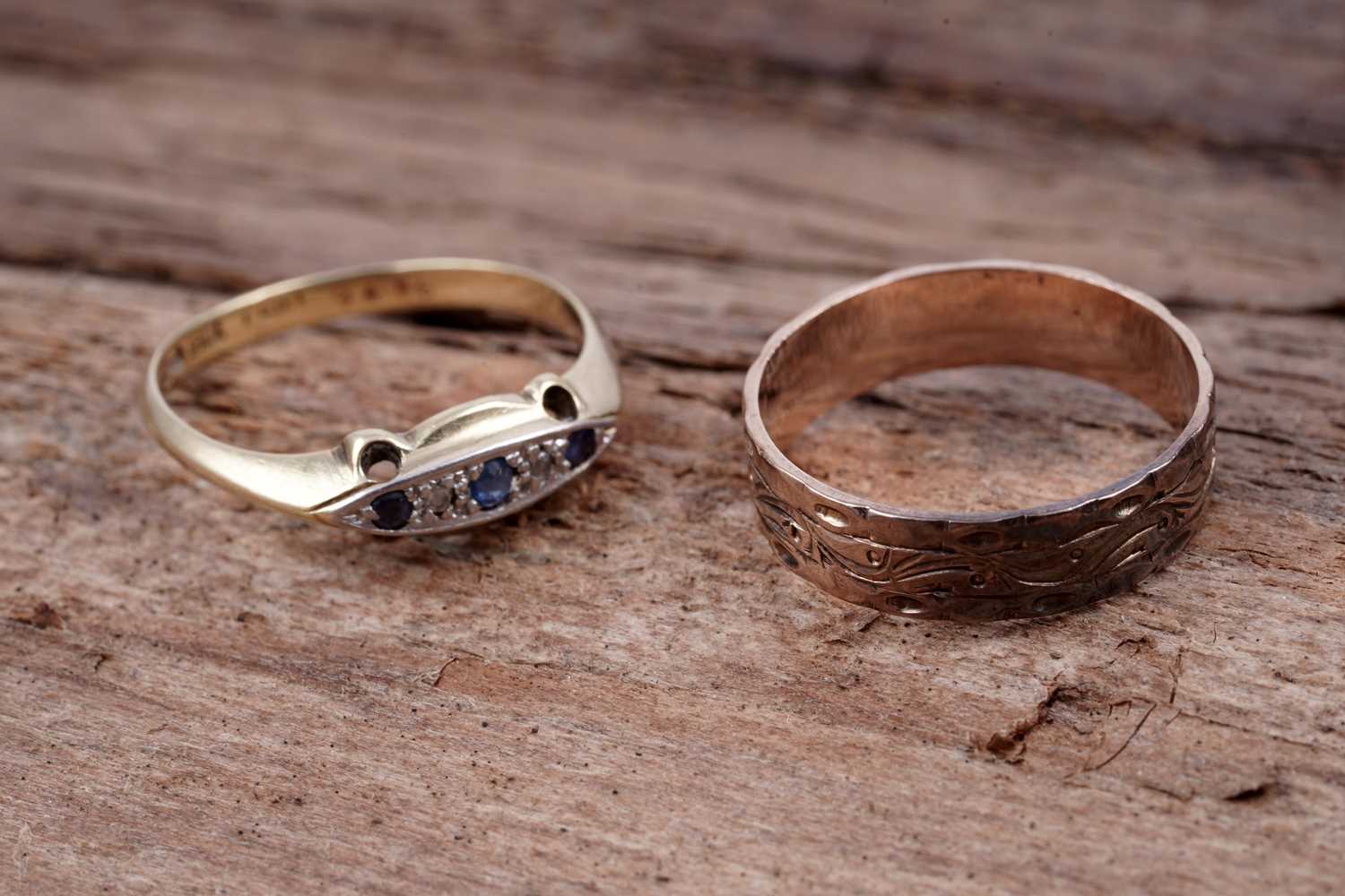 Lot 94 - An early 20th Century sapphire and diamond ring; and a rose gold wedding band