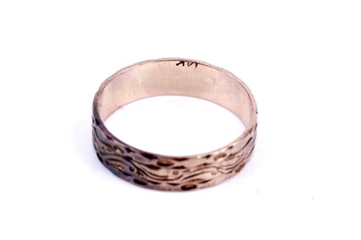 Lot 94 - An early 20th Century sapphire and diamond ring; and a rose gold wedding band