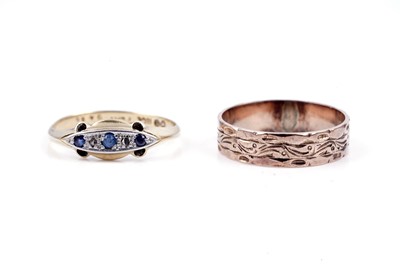 Lot 94 - An early 20th Century sapphire and diamond ring; and a rose gold wedding band