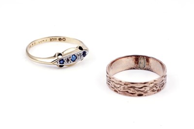 Lot 94 - An early 20th Century sapphire and diamond ring; and a rose gold wedding band