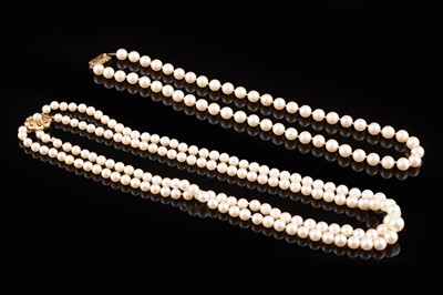 Lot 397 - A two-strand cultured pearl necklace; and a single strand necklace of cultured pearls