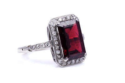 Lot 26 - An Art Deco style synthetic ruby and diamond dress ring
