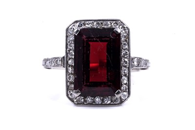 Lot 26 - An Art Deco style synthetic ruby and diamond dress ring