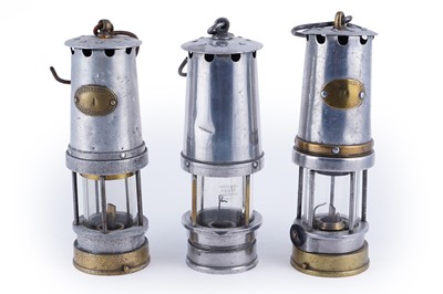 Lot 246 - Two Patterson Type A lamps; and another Patterson & Co lamp