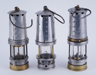 Lot 246 - Two Patterson Type A lamps; and another Patterson & Co lamp