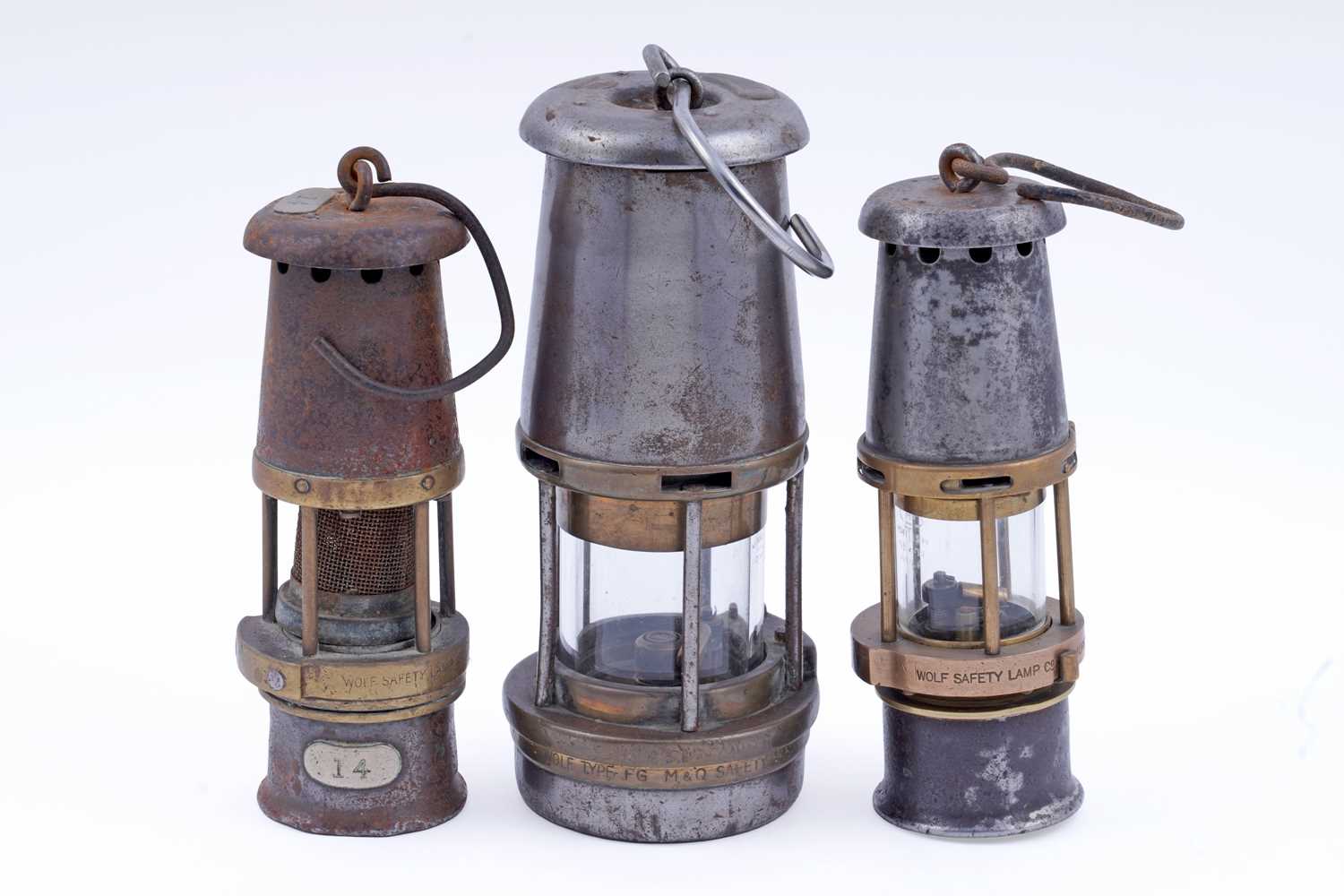 Lot 191 - Two ‘Baby Wolf’ miners' lamps; and a Wolf Type FG lamp