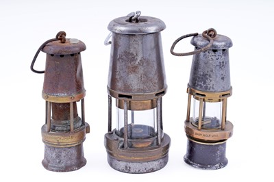Lot 191 - Two ‘Baby Wolf’ miners' lamps; and a Wolf Type FG lamp