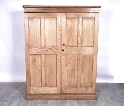 Lot 76 - A 20th Century pine school cupboard