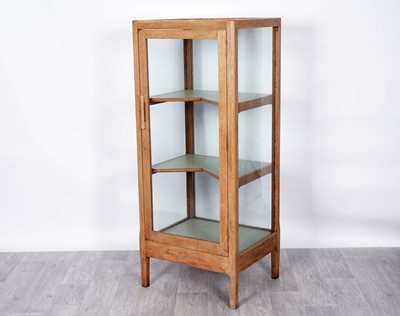 Lot 91 - An early 20th Century Art Deco-style limed oak display cabinet