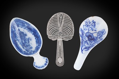 Lot 165 - An early 19th Century glazed blue and white pottery caddy spoon; and two others